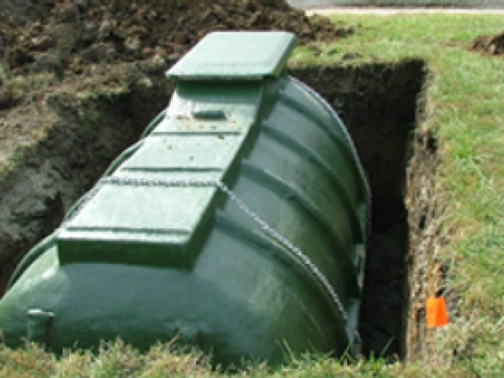 Underground storm shelter set in an excavated trench in Central Indiana